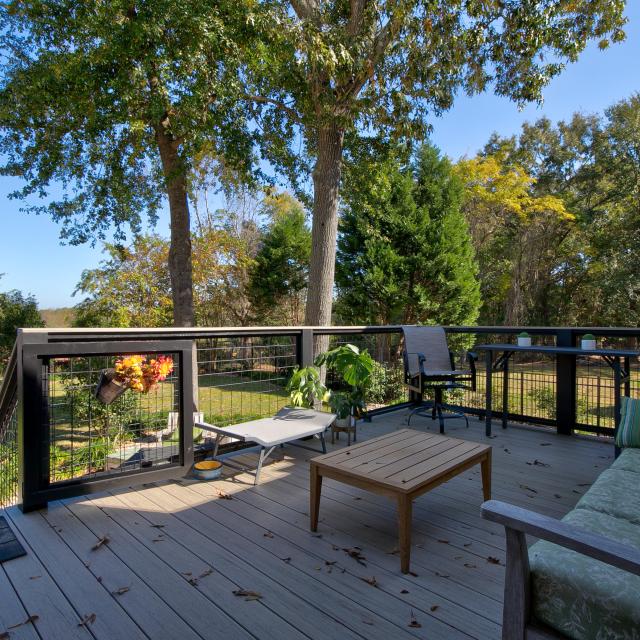 Back porch with patio furniture.