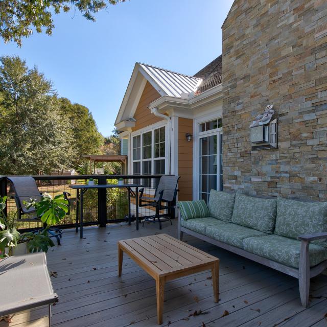 Back porch with patio furniture.