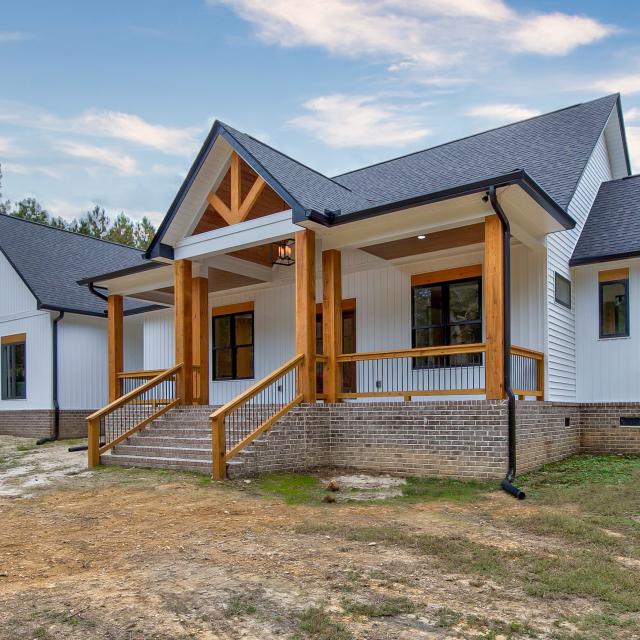 Home Exterior - Front - White Craftsman Style Home